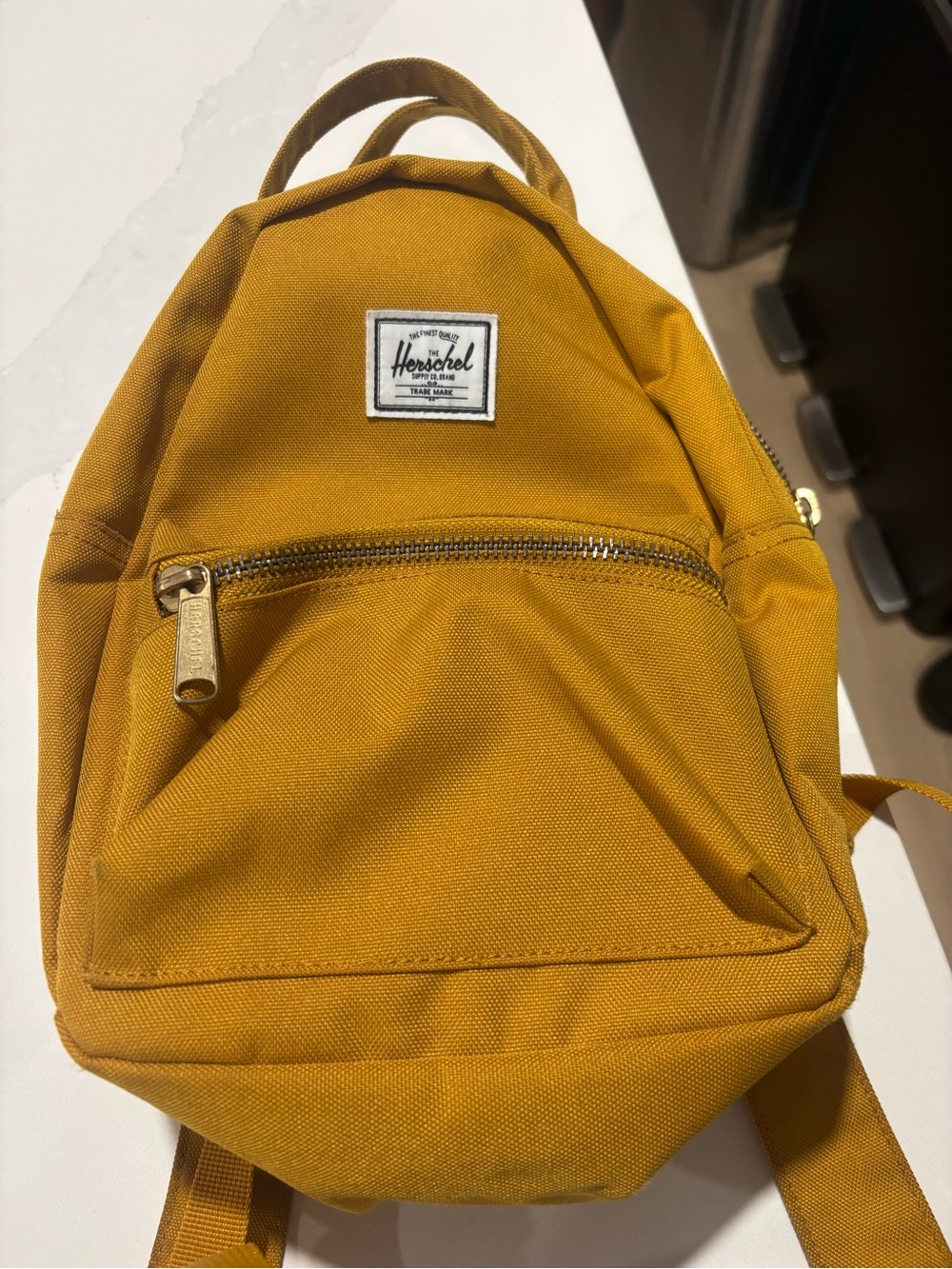 Herschel Supply Company Mini Backpack in Mustard